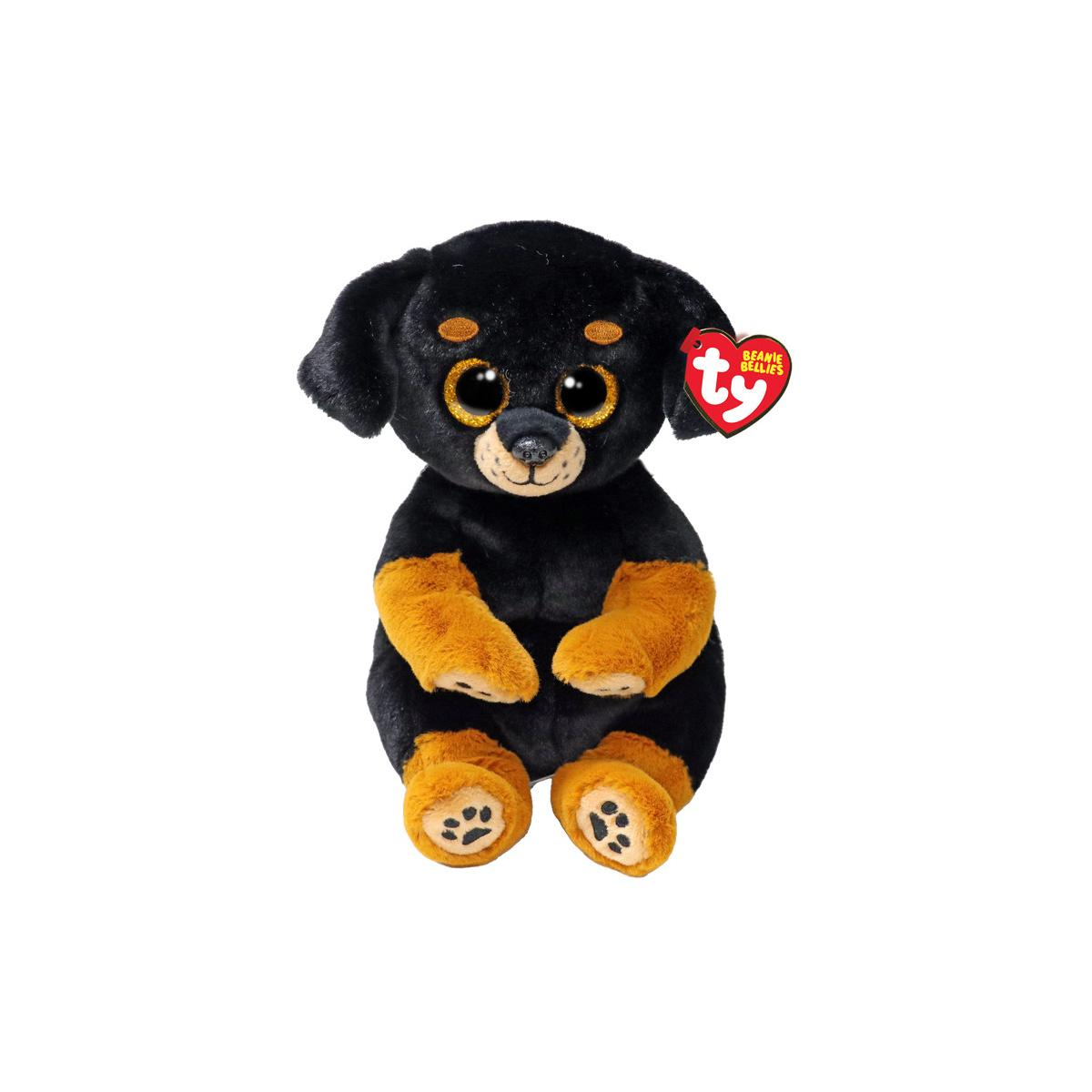 Un cane di peluche nero e marrone con grandi occhi scintillanti seduto su sfondo bianco.