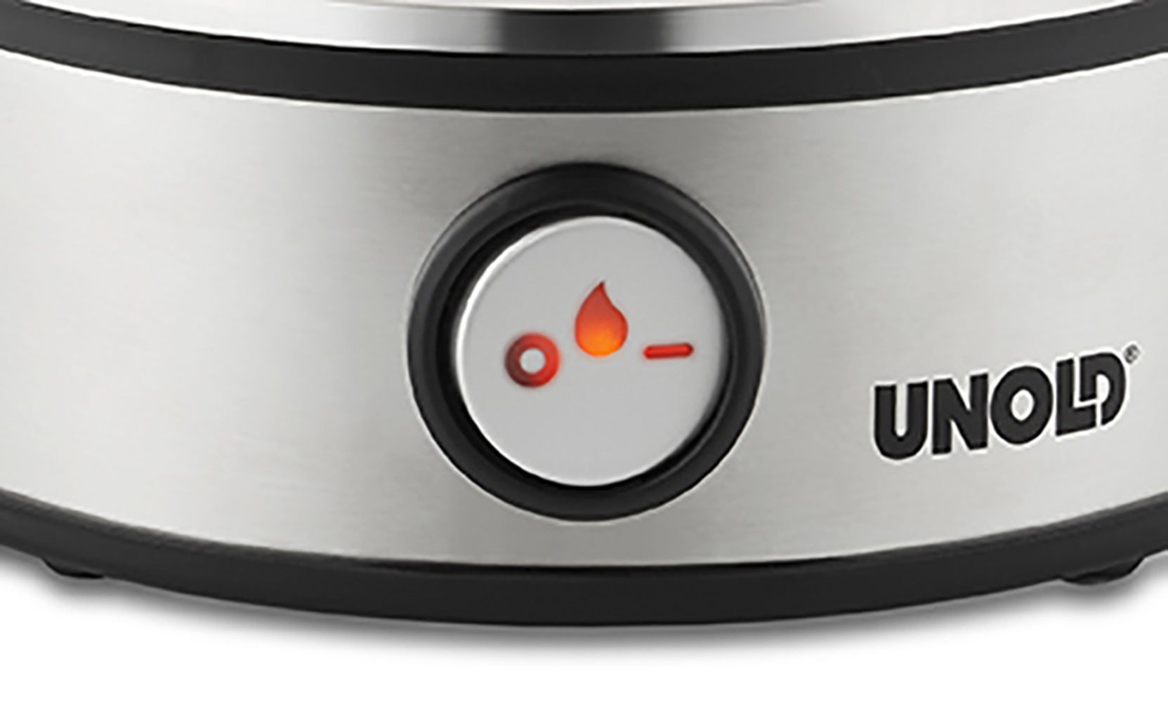 Zbliżenie srebrnego urządzenia z czarną krawędzią. Okrągły przycisk ma ikonę płomienia.