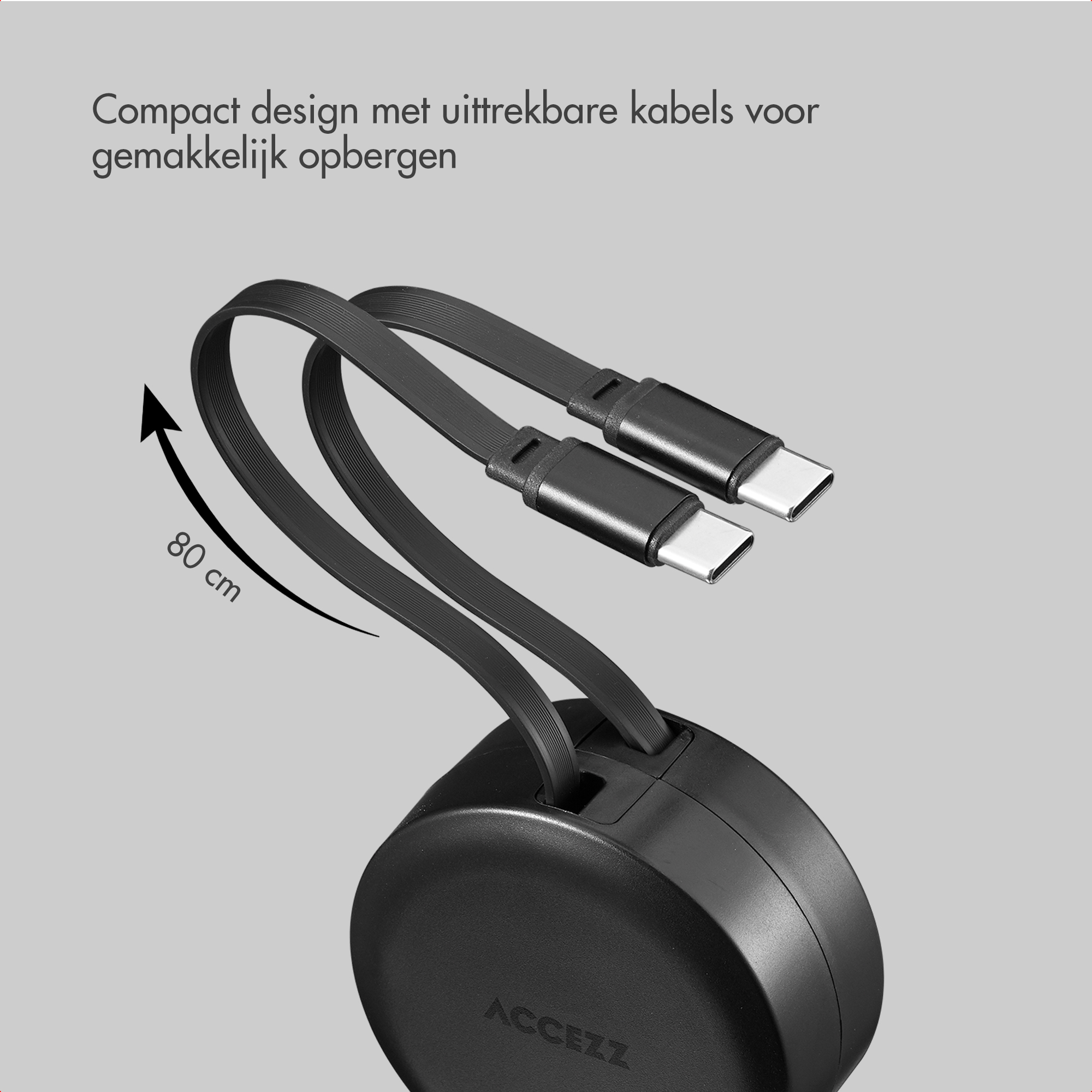 Avvolgicavo nero con due cavi USB-C retrattili, lunghi 80 cm.