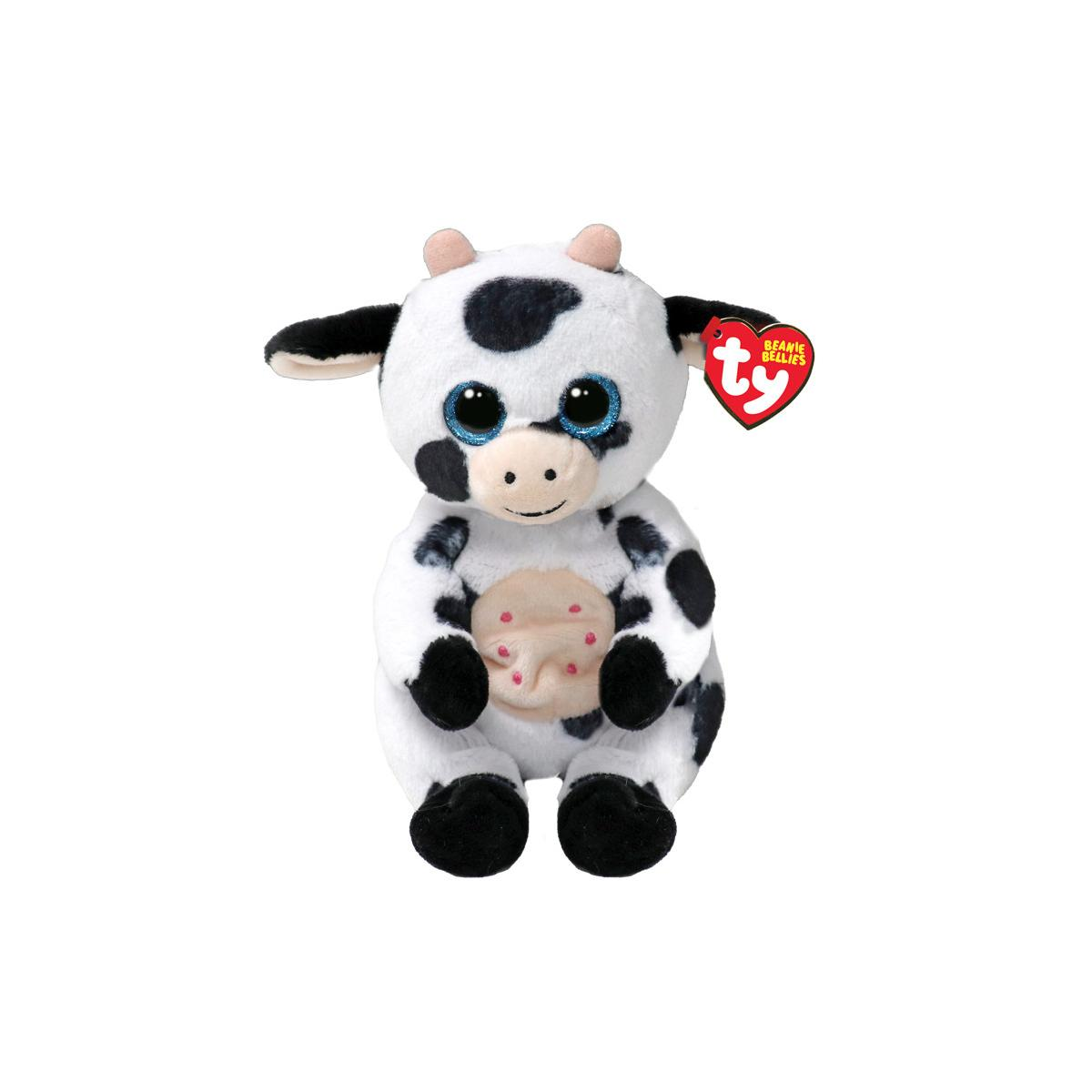 Un peluche di mucca con macchie nere e occhi blu.