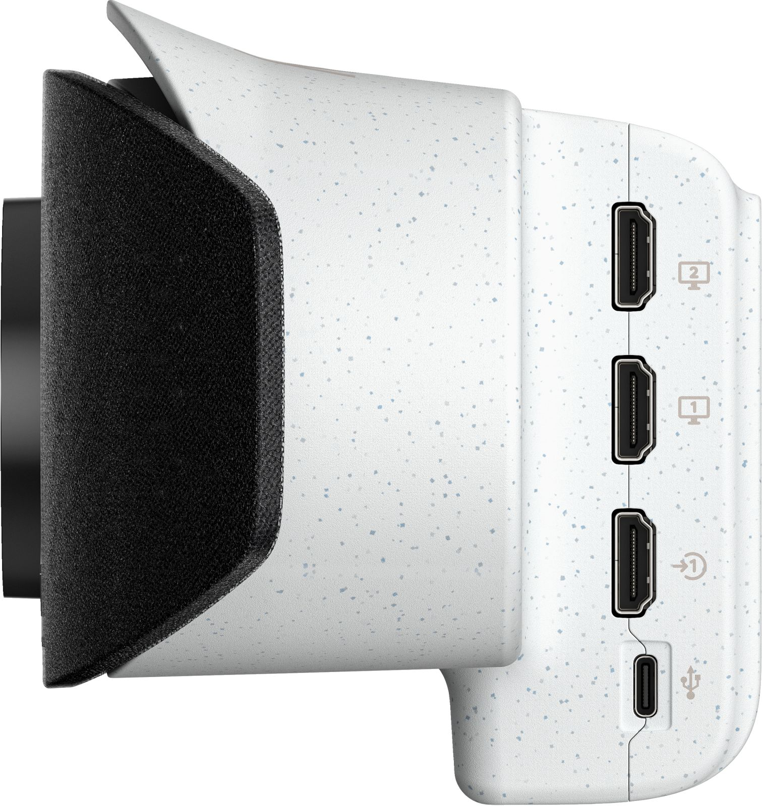 Fotocamera bianca con motivo screziato, mostra porte HDMI e USB-C.