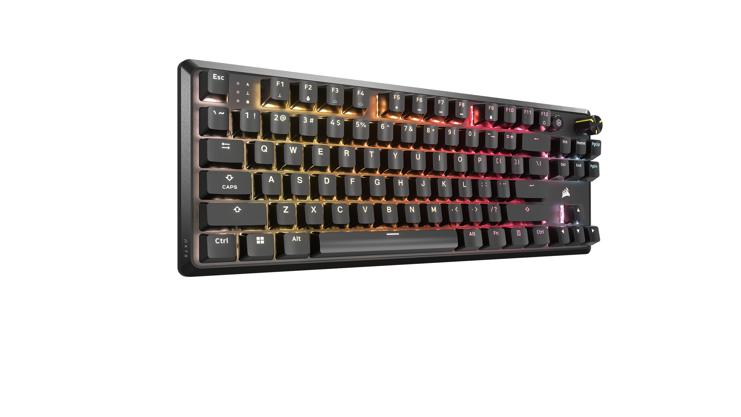 Una tastiera meccanica da gioco nera con illuminazione RGB, su una superficie scura.