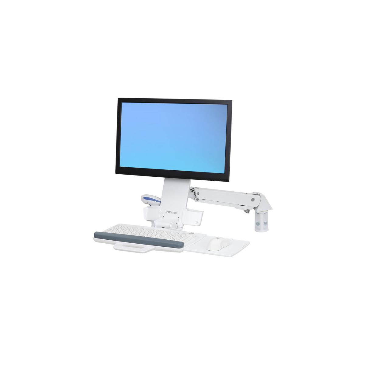 Un monitor di computer bianco su un braccio regolabile con tastiera e mouse.