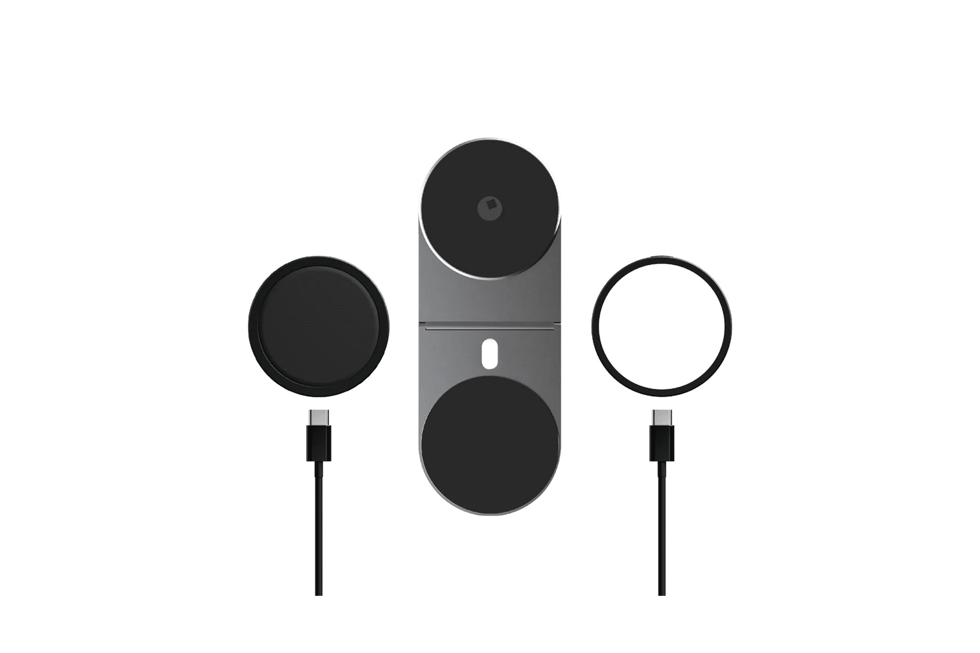 Caricatore argento con due pad circolari neri e cavi USB-C.