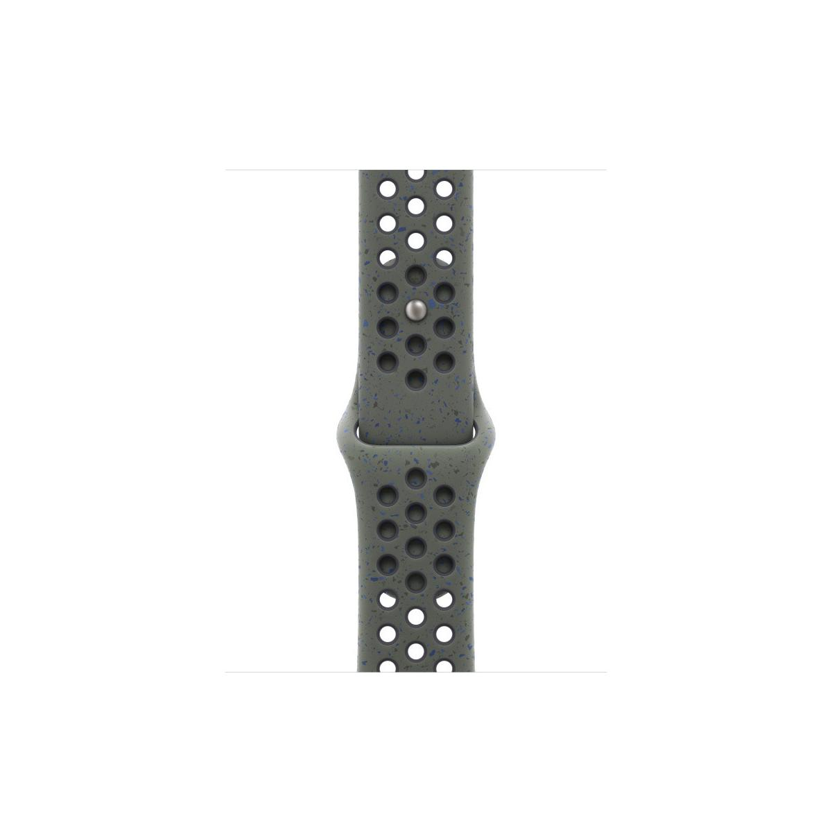 A grey watch band with many circular perforations and blue speckles.