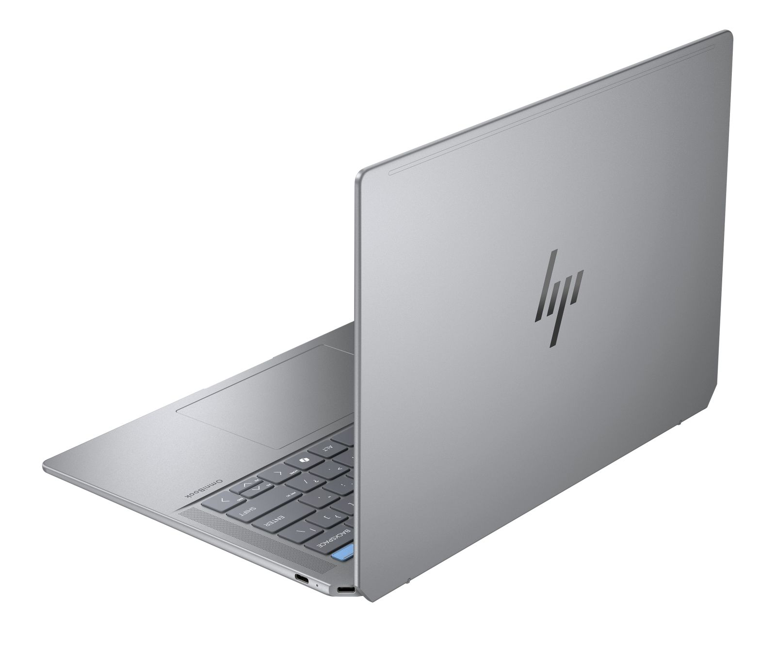 Un laptop HP argentato è aperto, mostra tastiera e trackpad. Il coperchio è inclinato all'indietro.