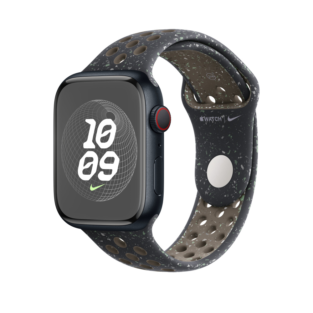 A dark gray Apple Watch with a speckled band showing 10:09. Nike logo visible.