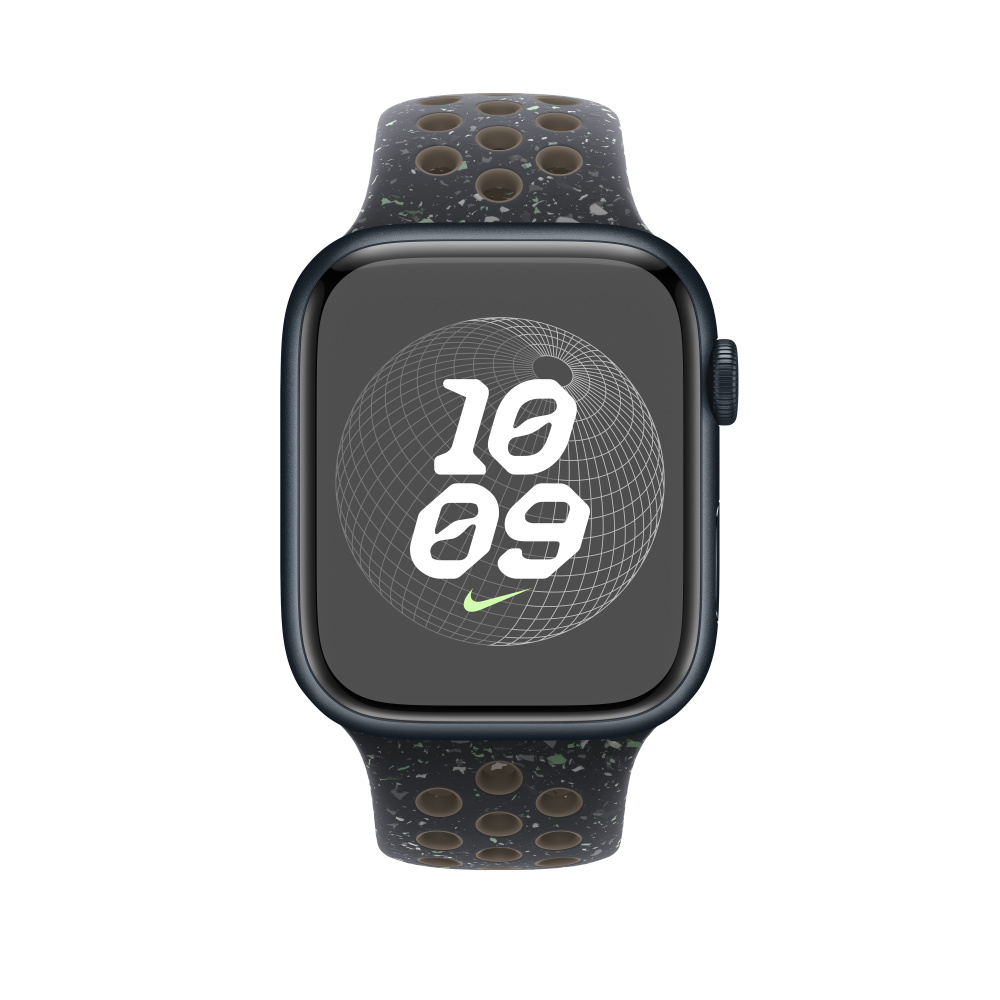 A dark Apple Watch with a speckled band displays the time 10:09 and a Nike logo.