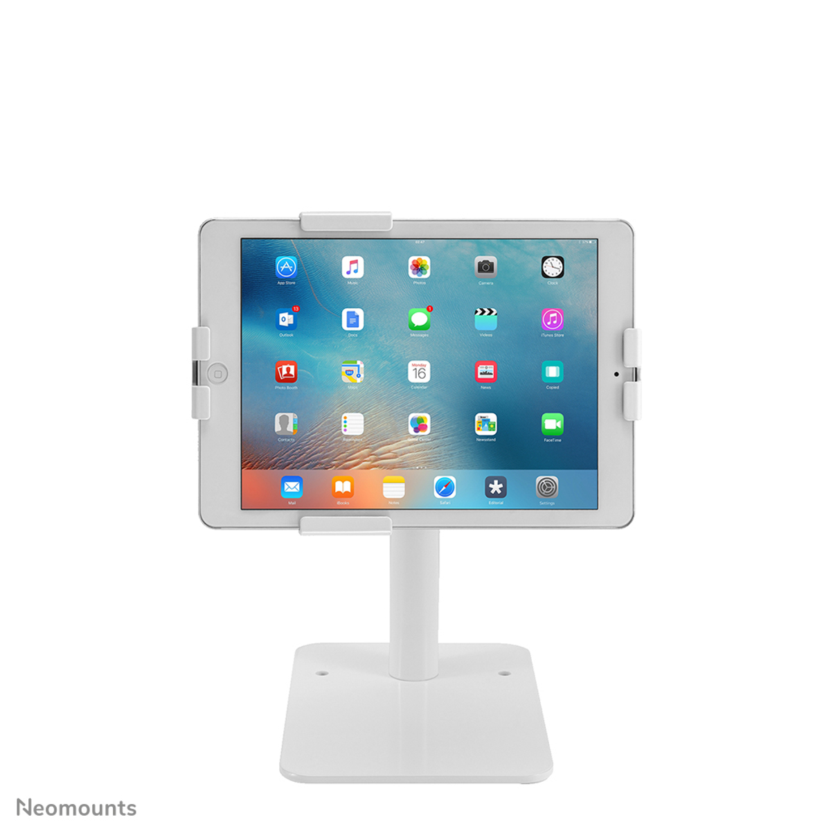 iPad bianco su supporto bianco, mostra icone di app colorate su sfondo neutro.