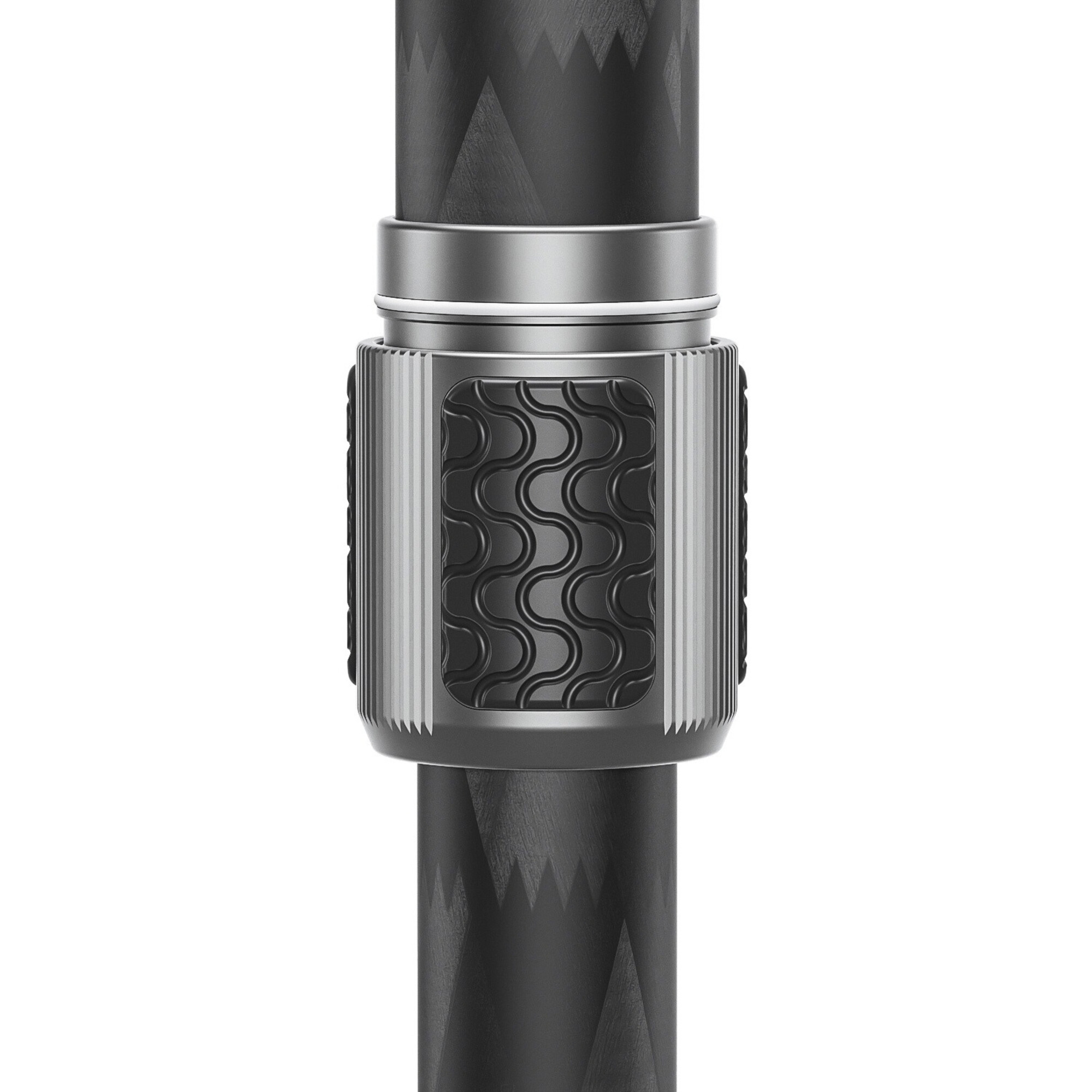 Nahaufnahme eines grauen Metallknopfs mit schwarzem Wellengriff an einem schwarzen Stiel.