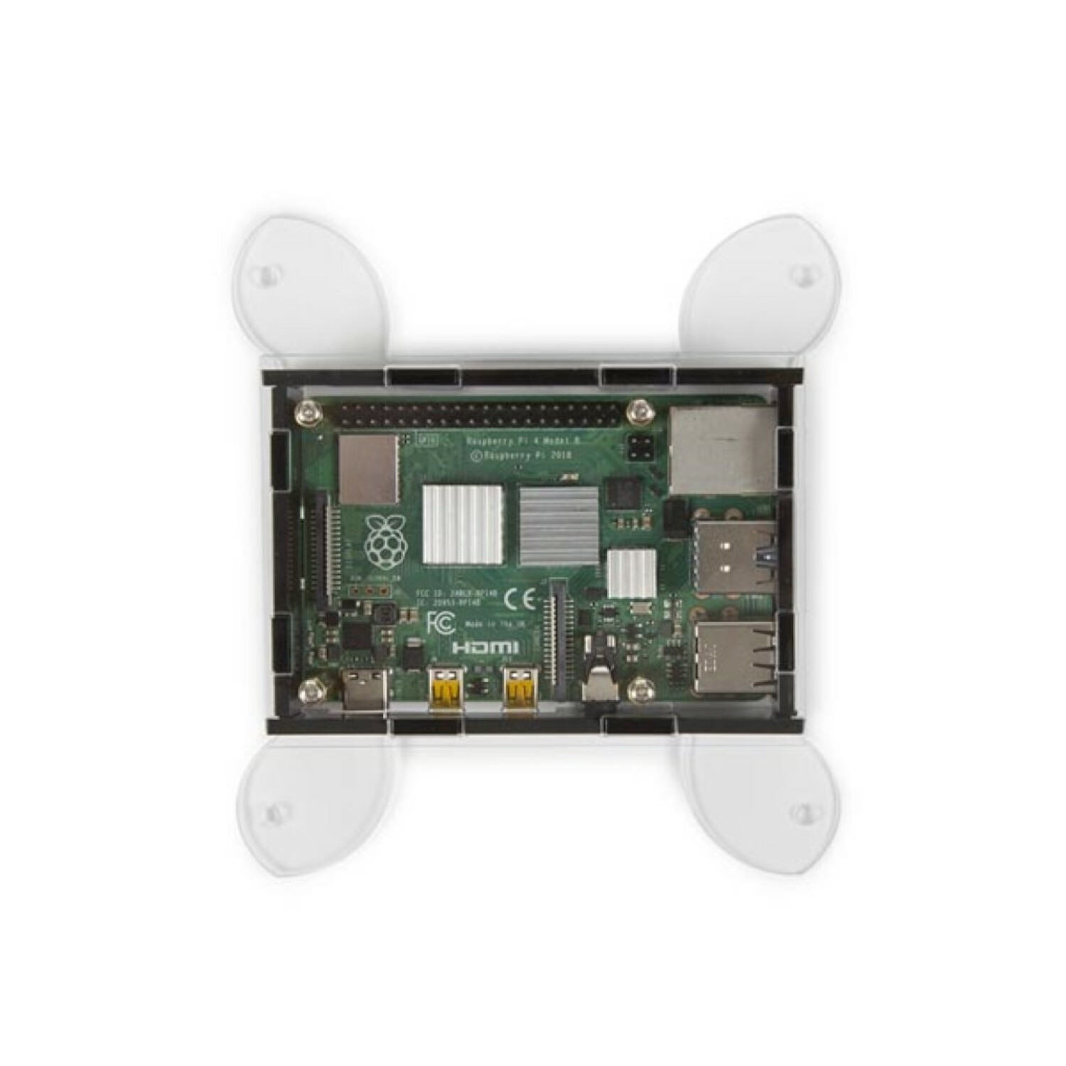 Una scheda Raspberry Pi 4 Modello B in un case trasparente con quattro ventose trasparenti.
