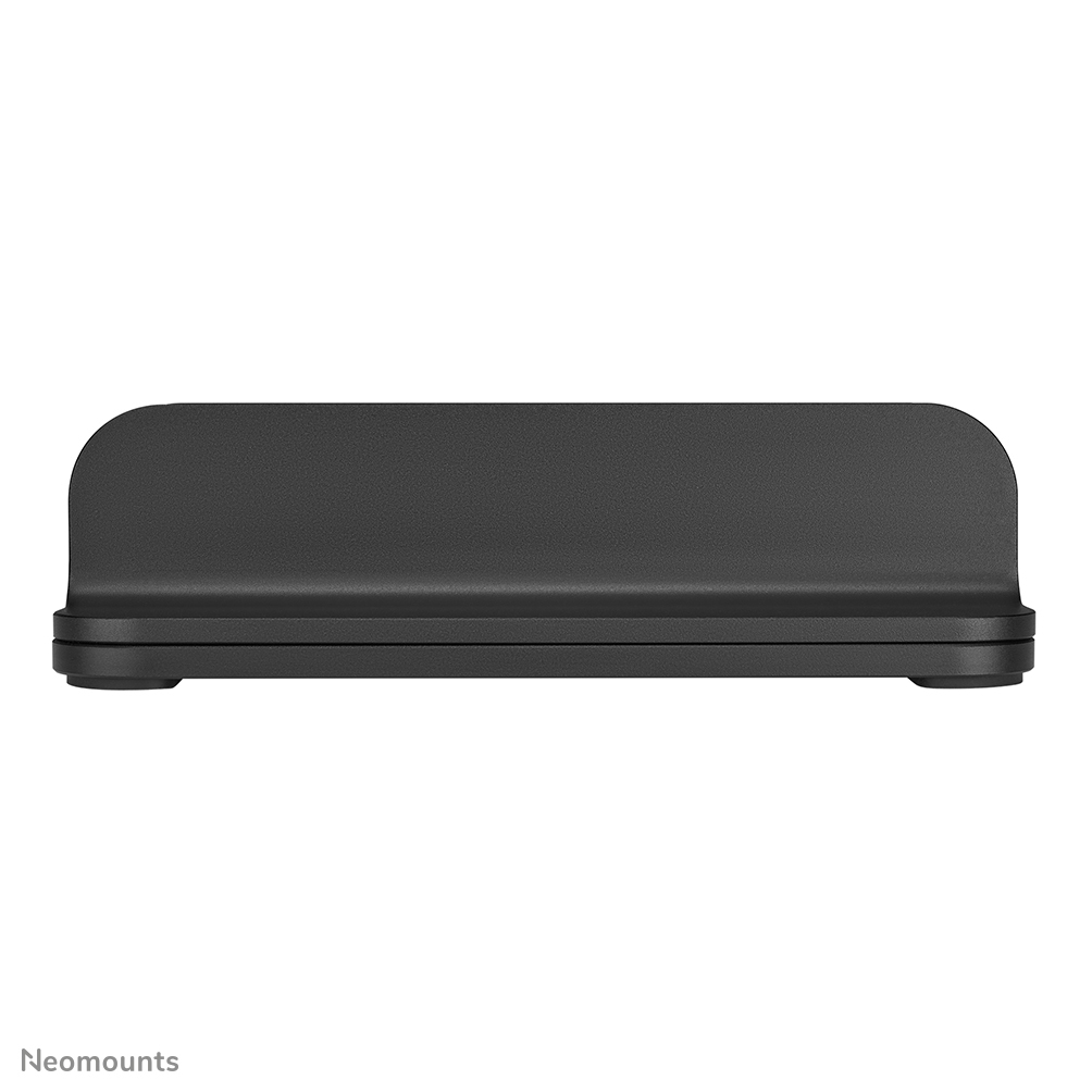 A black, rectangular device with rounded corners and four feet.