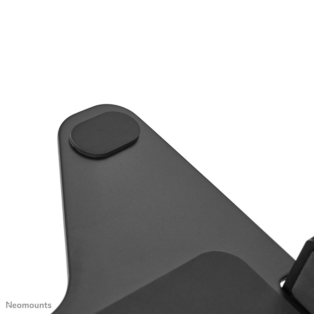 Close-up of a black mount with rubber feet for stability.