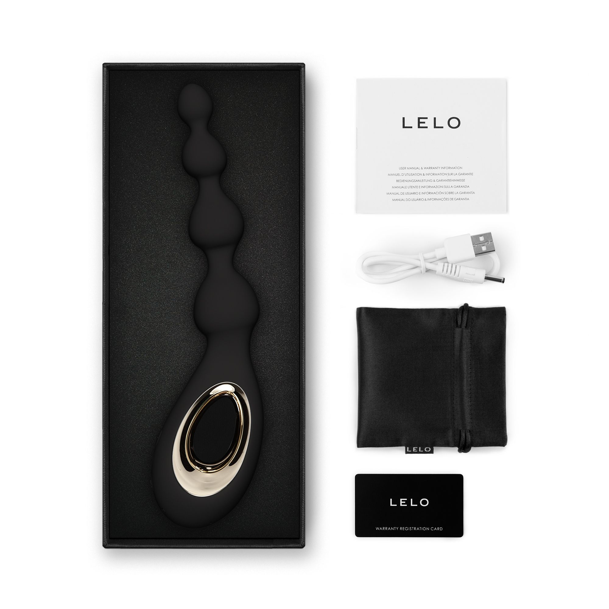 Vibrador Lelo negro en caja, con manual, cable de carga, bolsa y tarjeta de garantía.