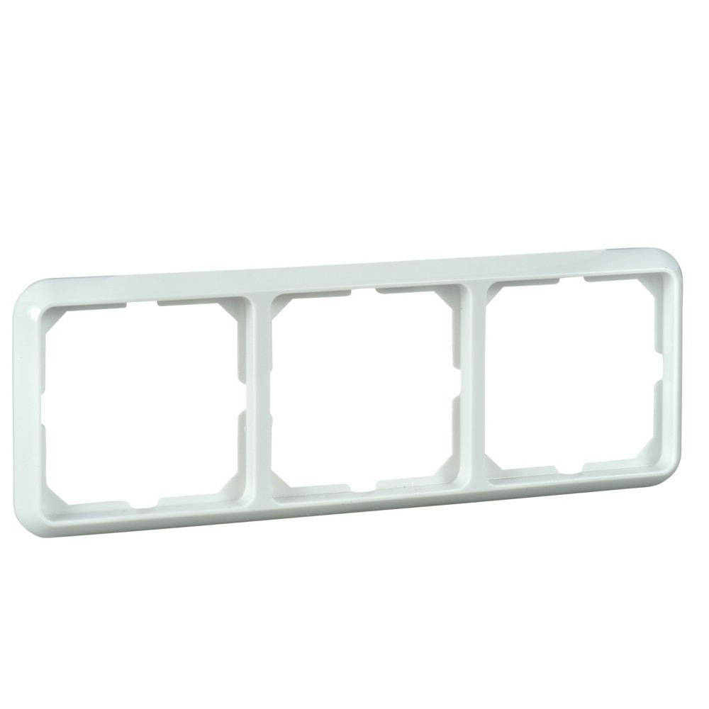 Una cornice bianca con tre aperture quadrate per interruttori o prese.