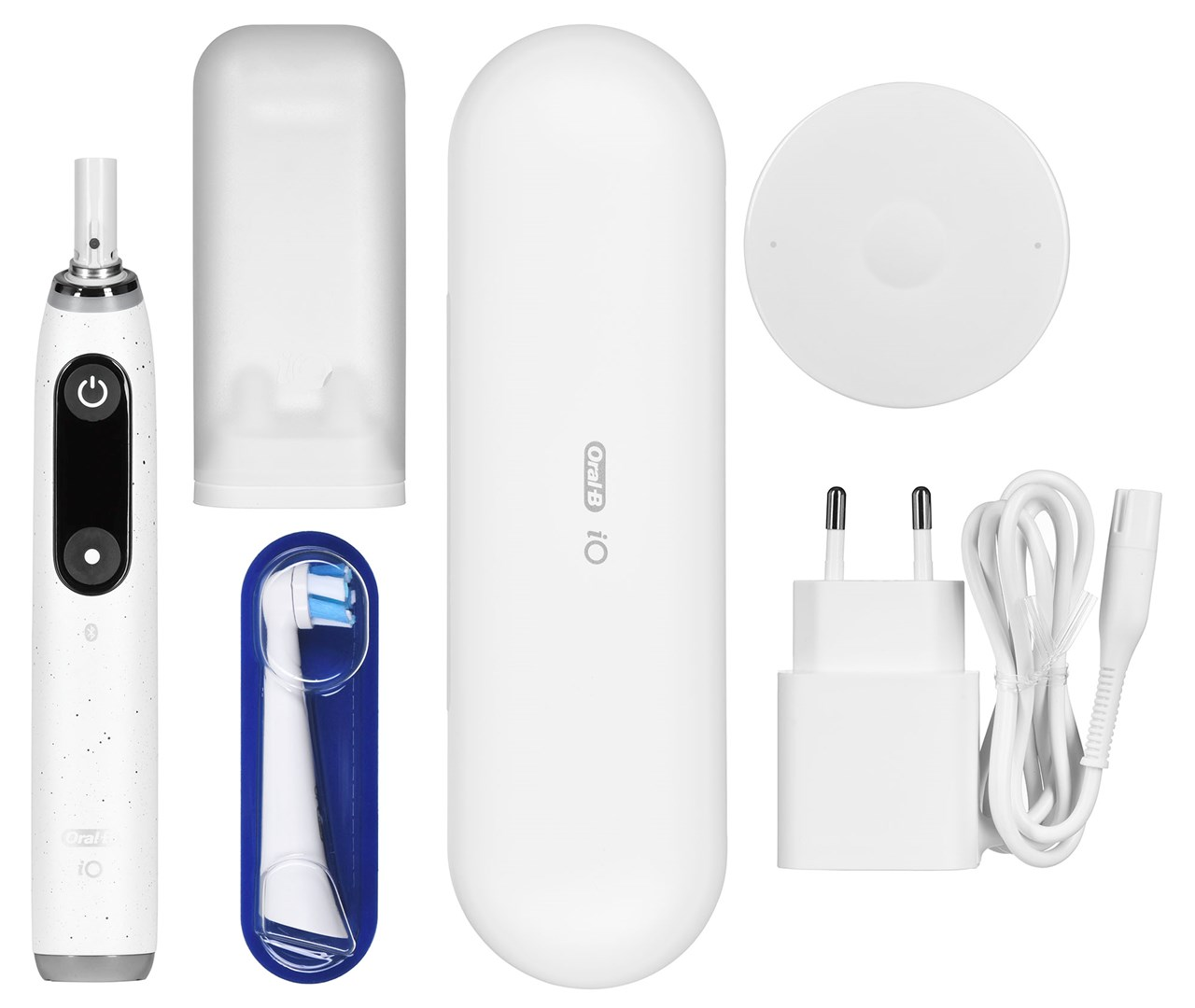 Biała szczoteczka elektryczna Oral-B z ładowarką, etui podróżnym, główką i wtyczką.