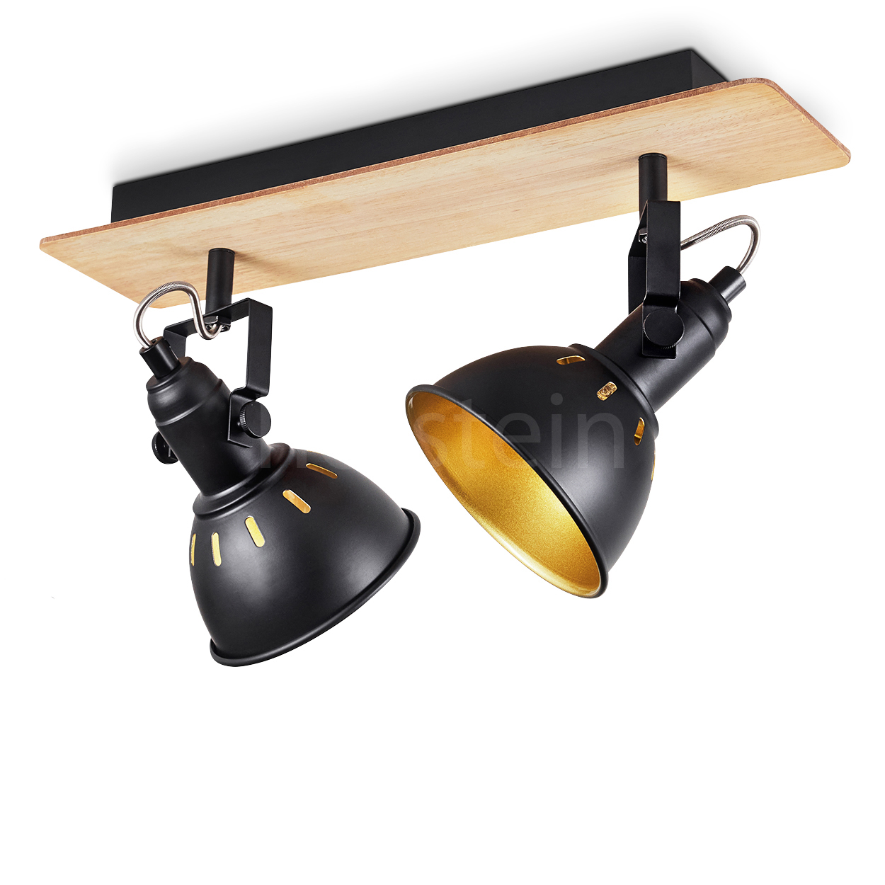 Zwei schwarze Lampenschirme mit goldener Innenseite auf Holzplatte.