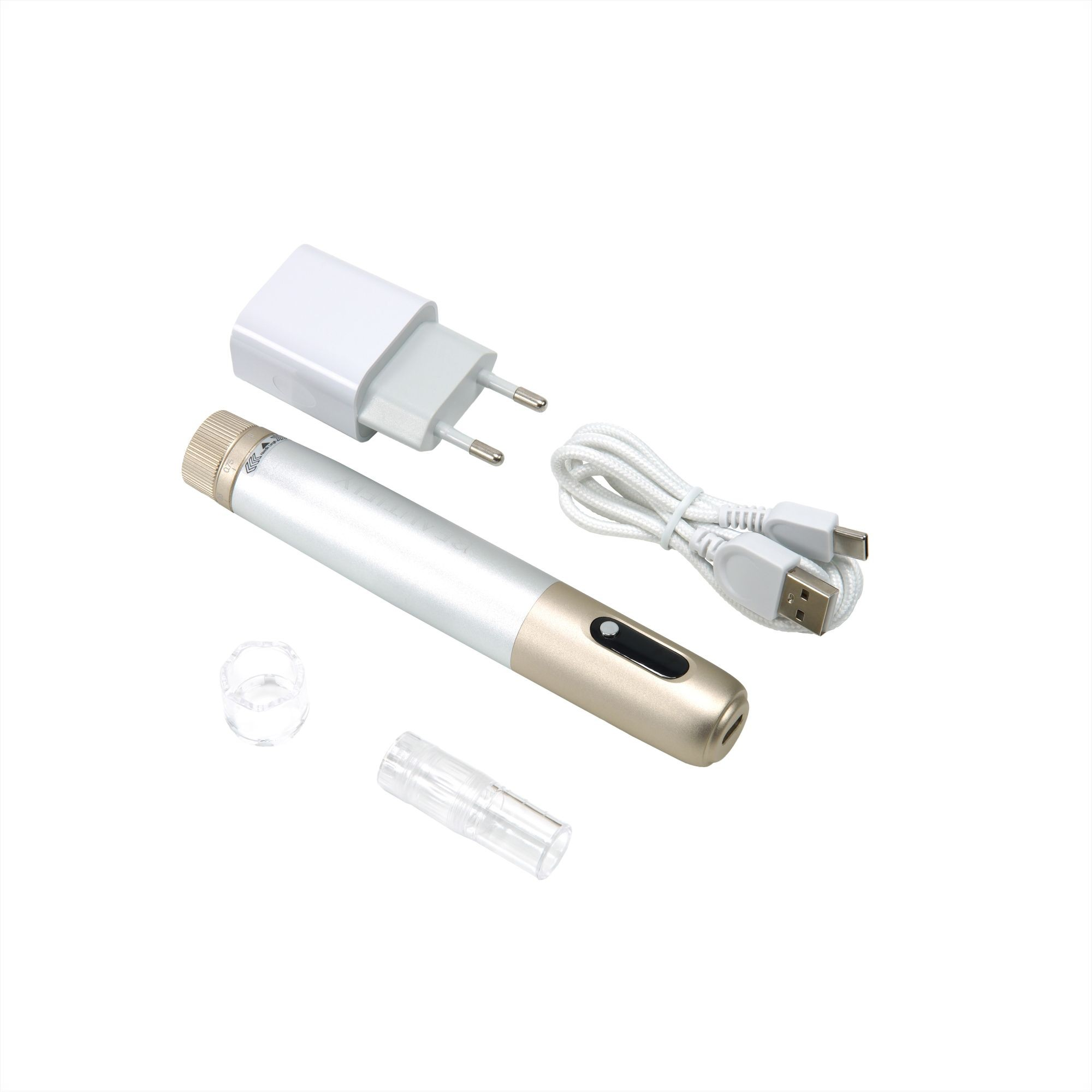 Srebrno-złote urządzenie w kształcie długopisu z kablem USB, ładowarką i przezroczystymi końcówkami.