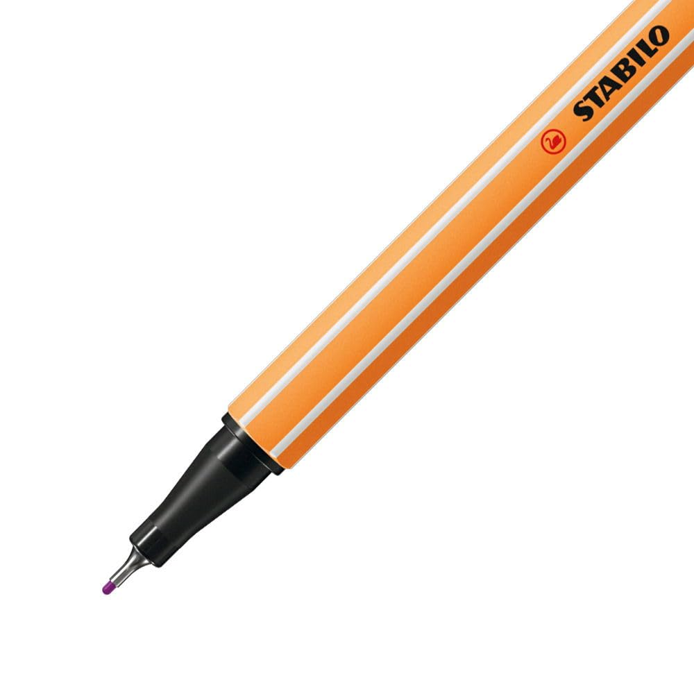 Penna arancione a righe bianche con punta viola. È visibile il nome del marchio Stabilo.