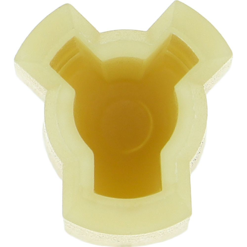 Un componente di plastica giallo chiaro a tre punte con una rientranza centrale.