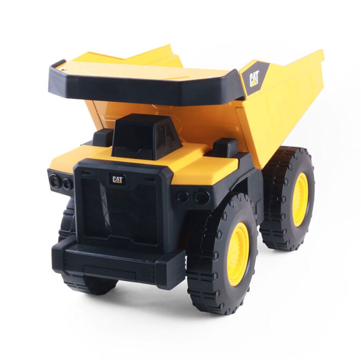 Camion dumper giocattolo CAT giallo con accenti neri e ruote grandi.