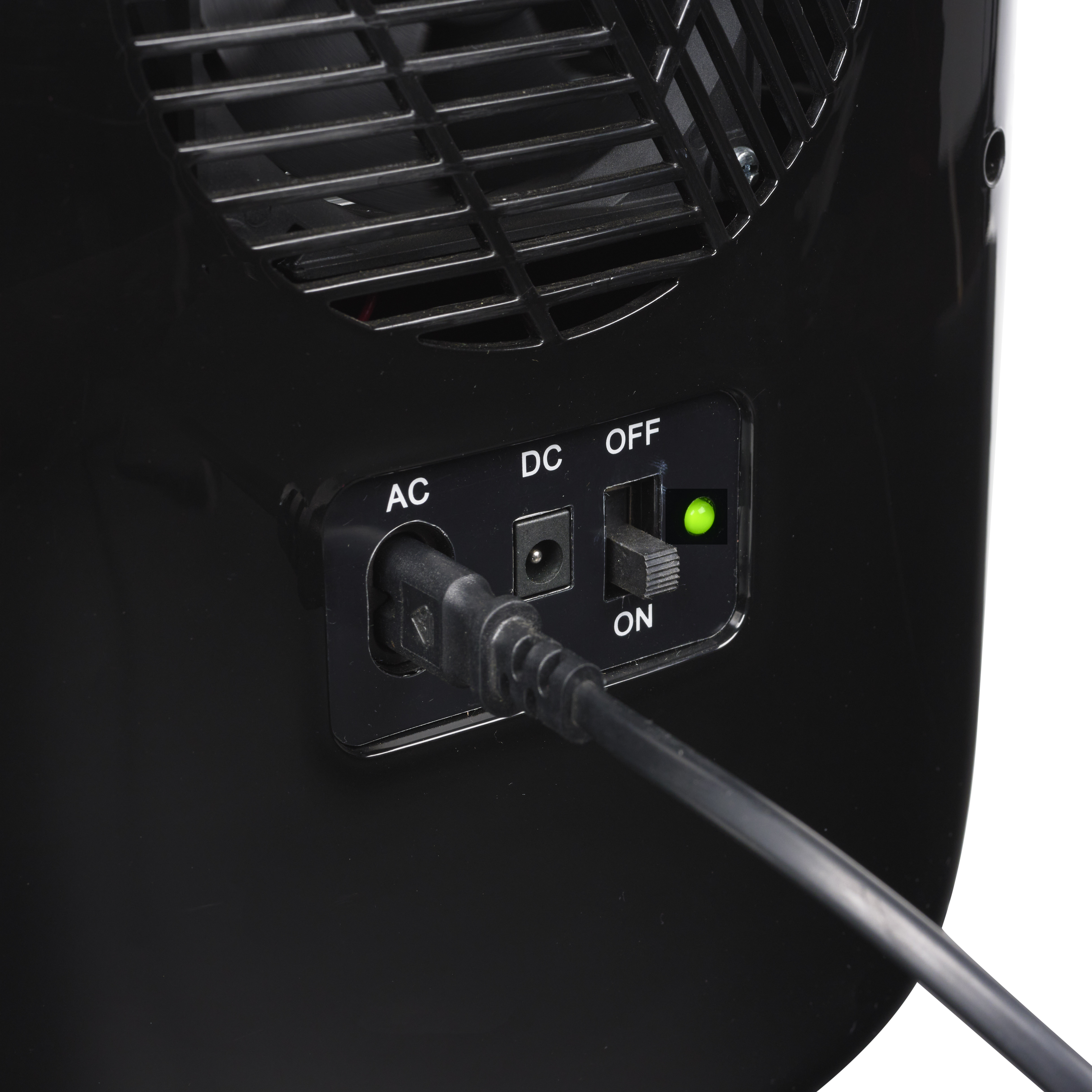 A black power cord is plugged in. A switch is set to 'ON', a green LED is lit.