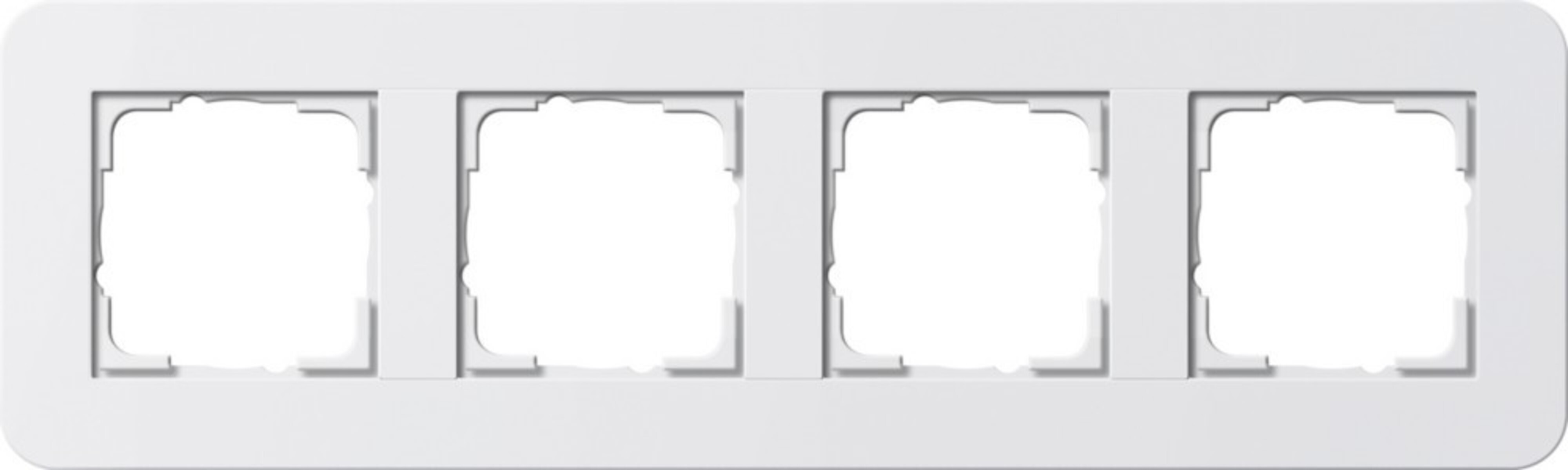 Una cornice bianca con quattro aperture quadrate per interruttori o prese.