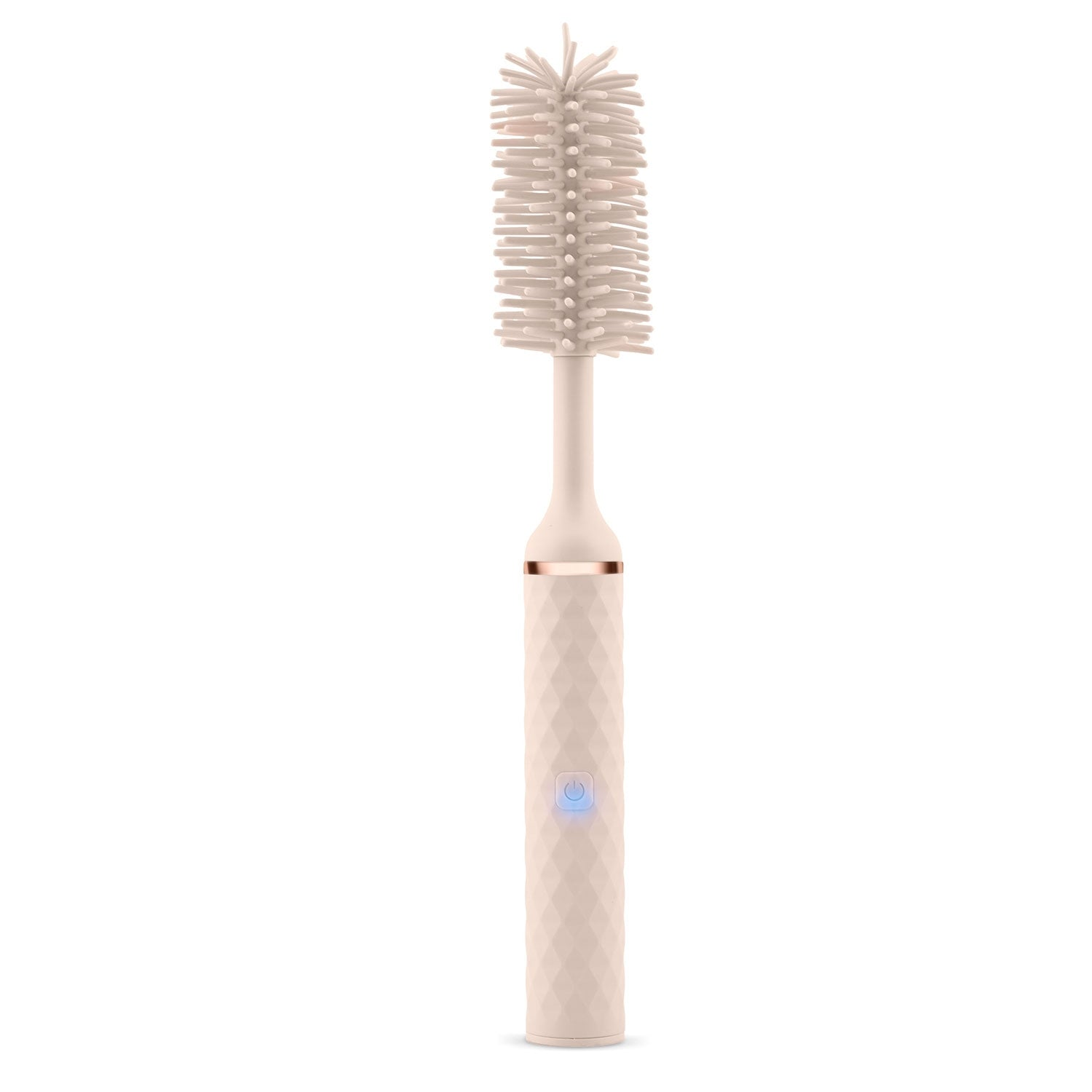 Cepillo eléctrico beige para biberones con botón de encendido y detalle oro rosa.