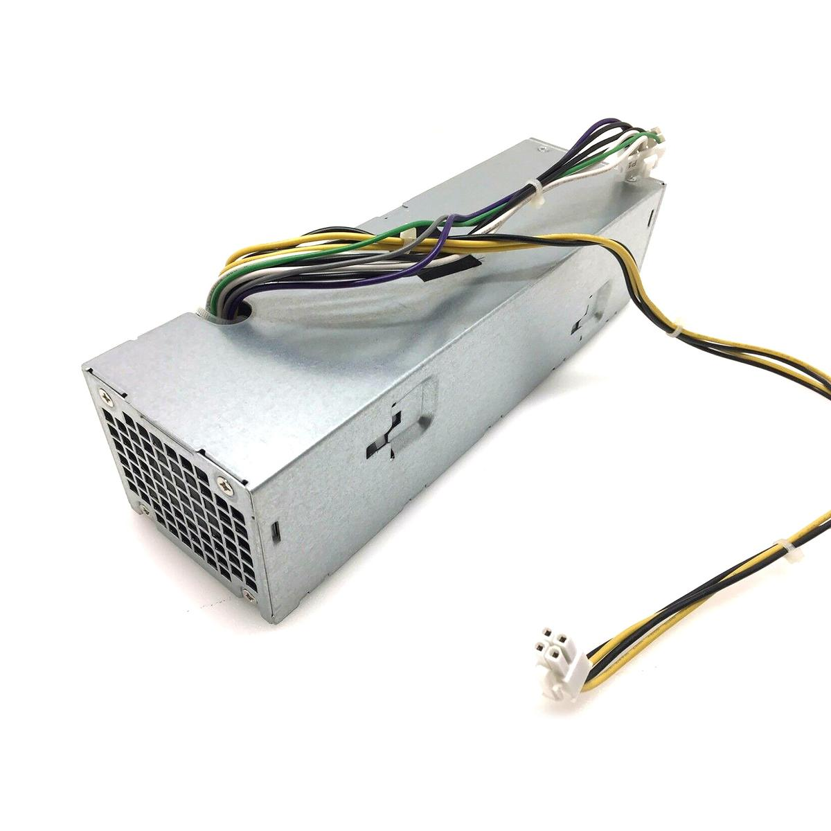 Un alimentatore per computer argentato con fili e connettori multicolore su sfondo bianco.