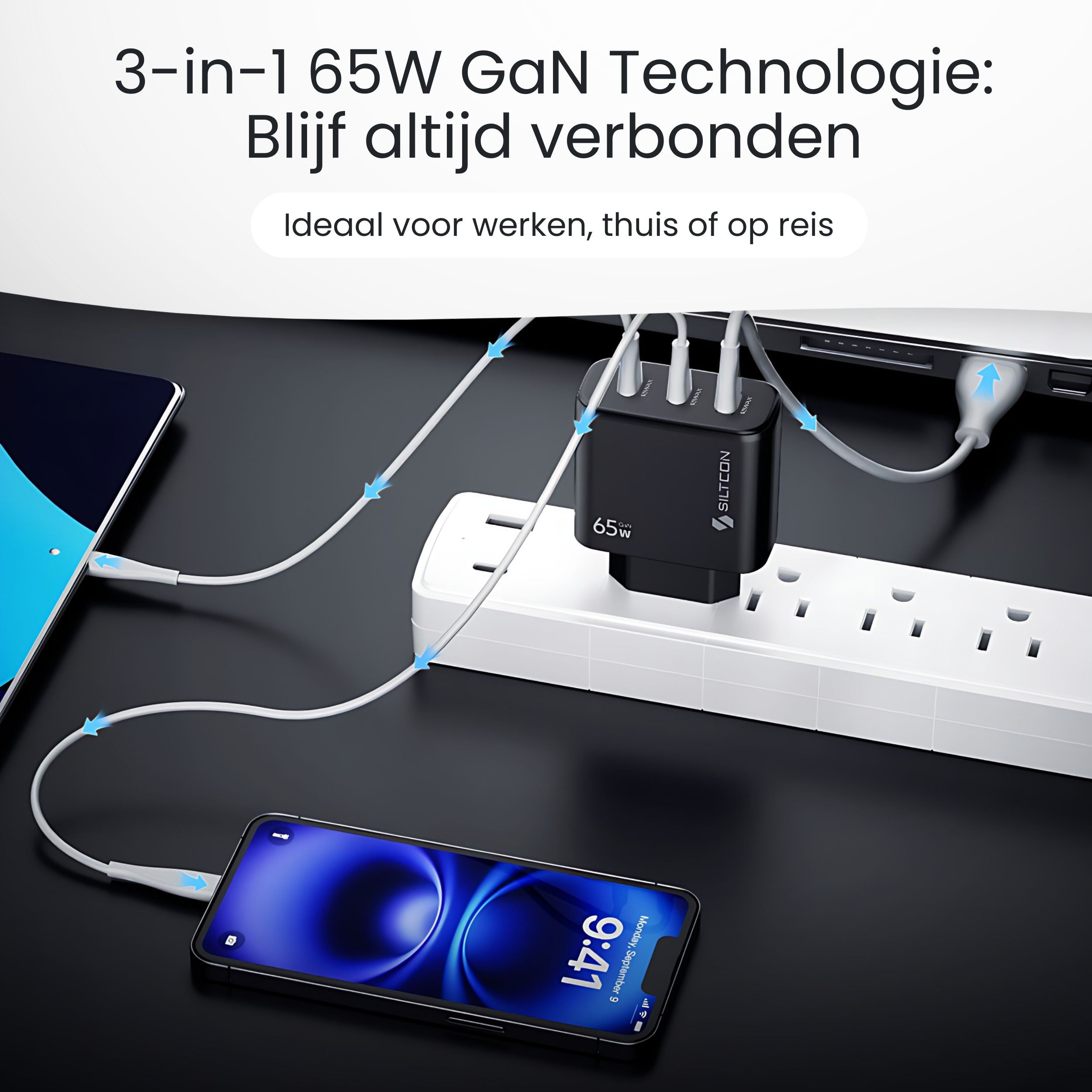 Een zwarte 65W GaN oplader verbindt een telefoon en tablet met een stekkerdoos.