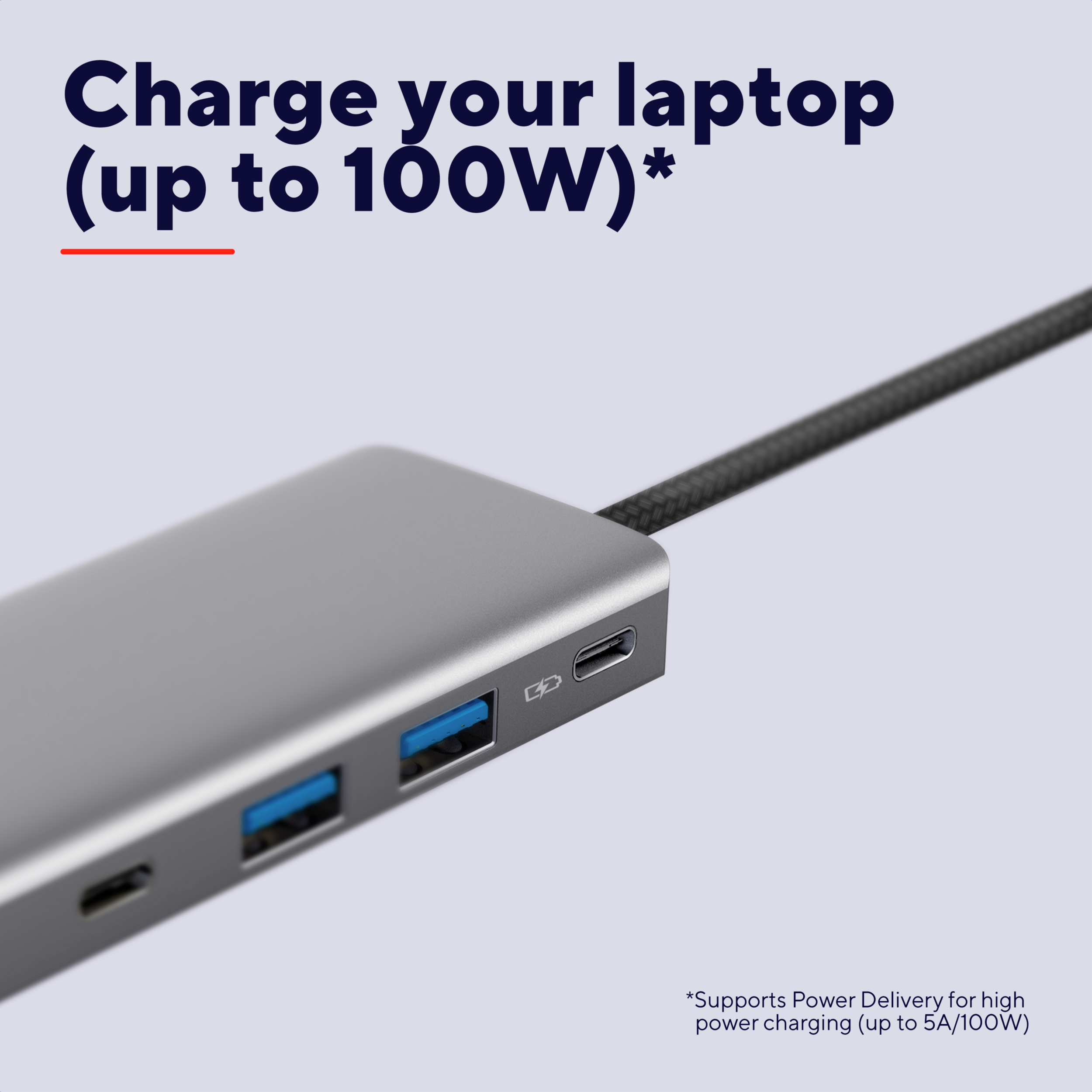 Hub argentato per laptop con porte USB-A, USB-C e icona di ricarica. Testo: 'Carica il tuo laptop (fino a 100W)'.
