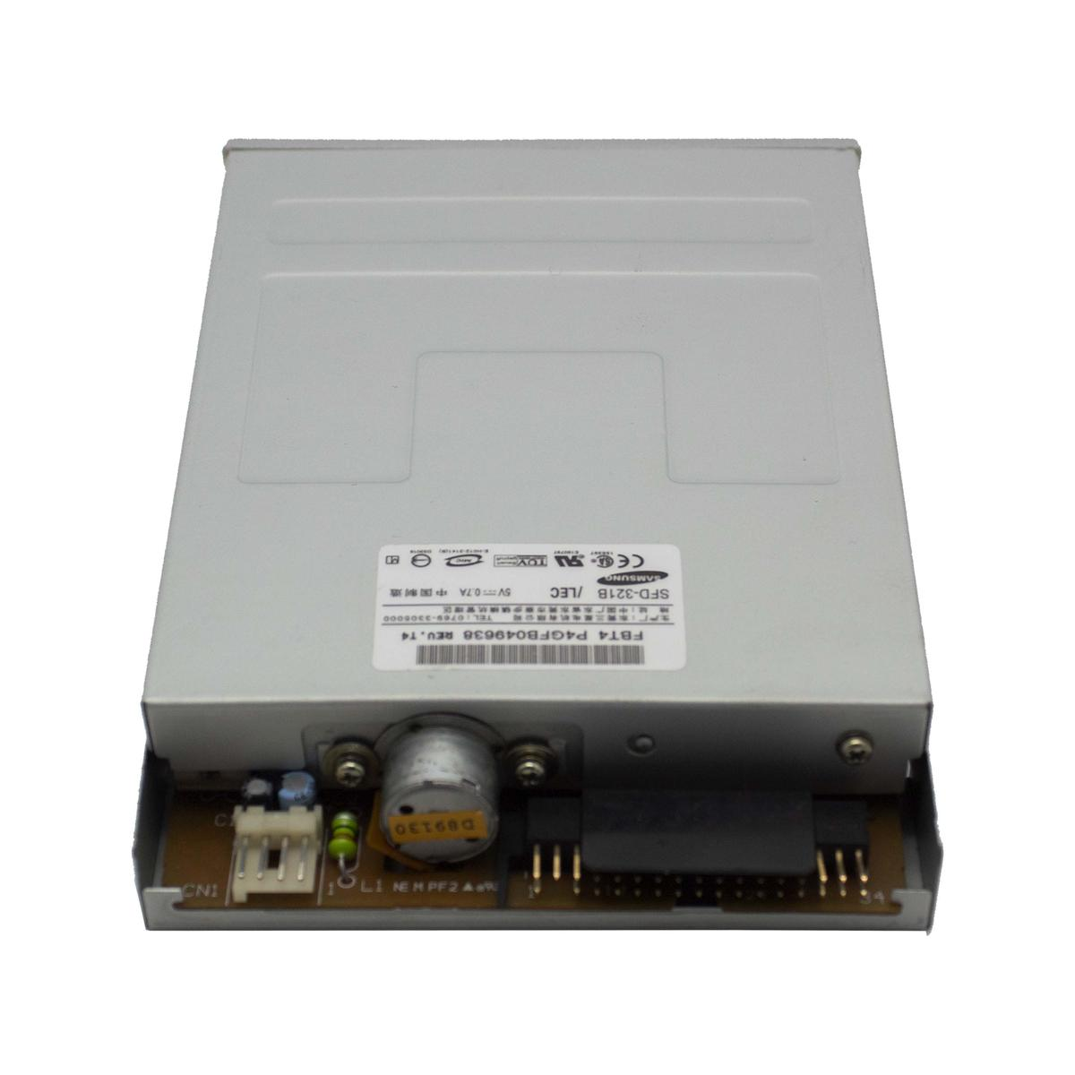 Unità DVD Samsung SFD-321B argentata con scheda elettronica visibile sotto.