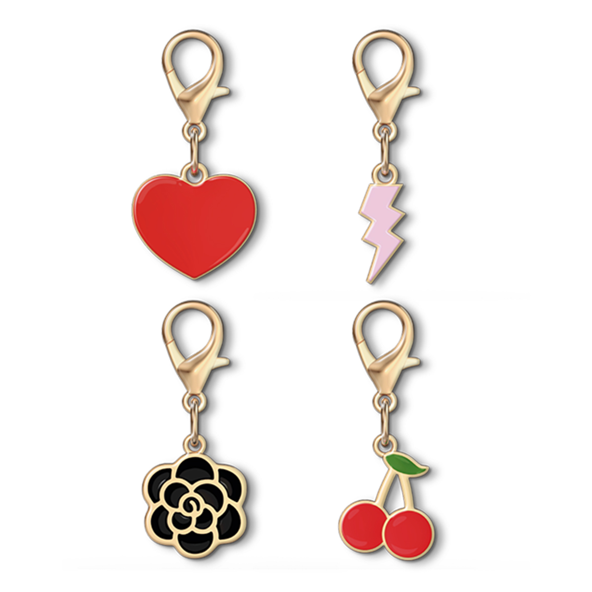 Quattro ciondoli dorati: cuore rosso, fulmine rosa, fiore nero e ciliegie rosse.