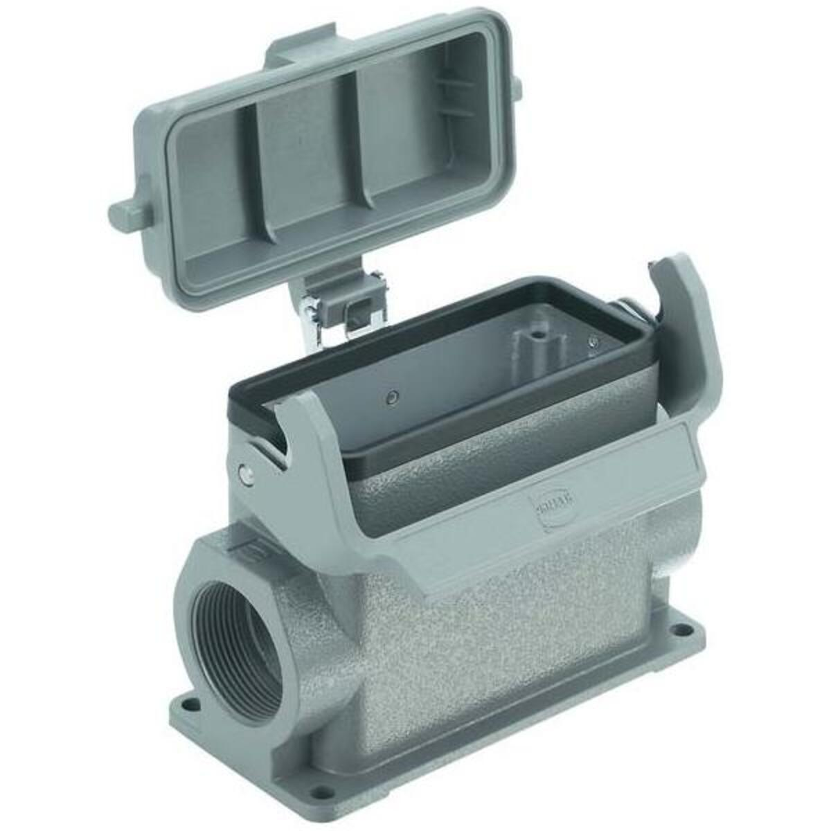 Contenitore connettore industriale grigio con coperchio aperto. Ha aperture filettate sul lato.