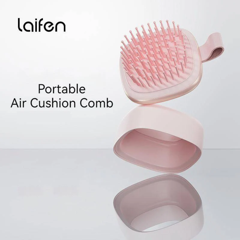 Ein rosa Kamm mit Luftkissen und dem Logo "laifen" und "Portable Air Cushion Comb".