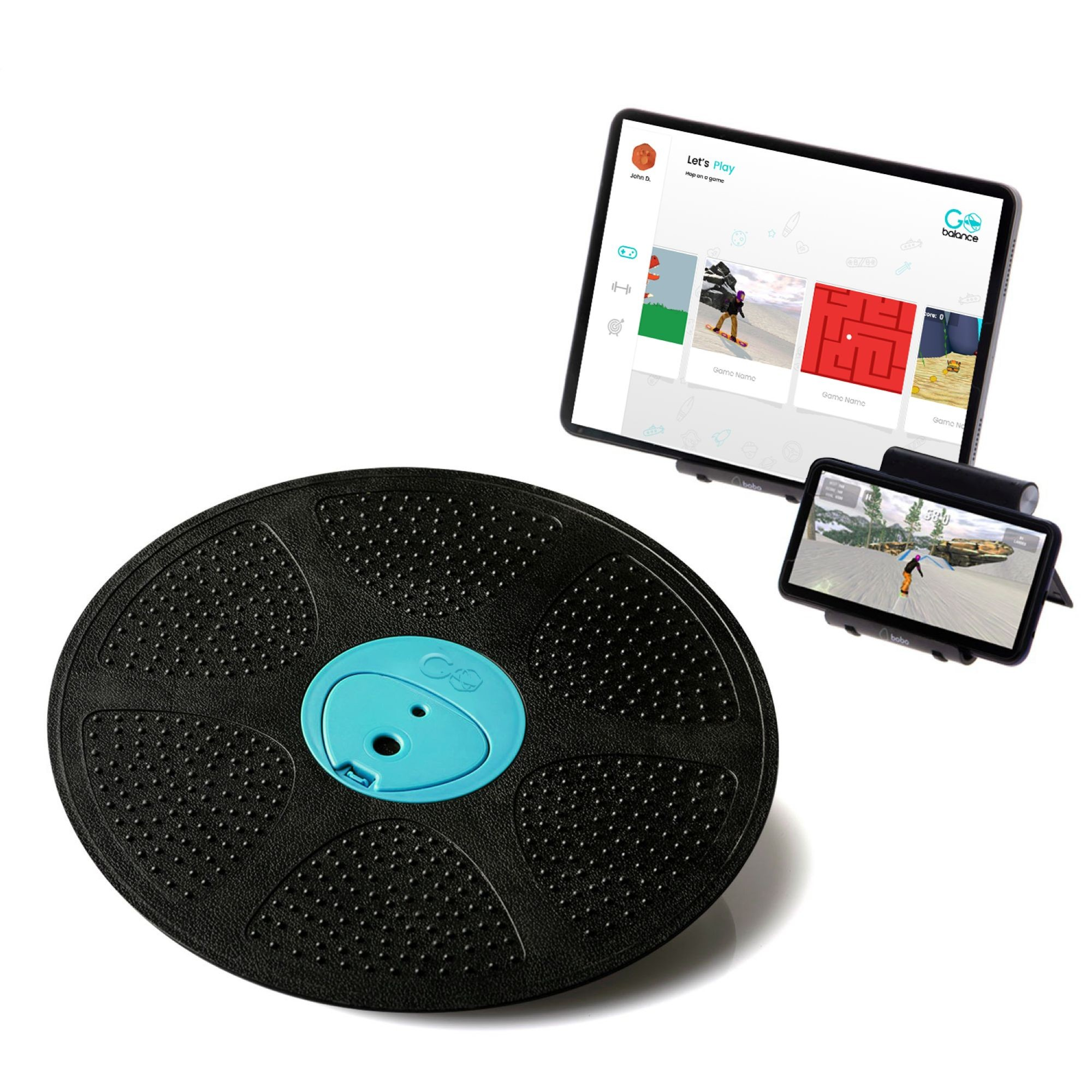 Ein schwarzes Balanceboard mit blauem Zentrum steht neben einem Tablet und Telefon, die Spiele anzeigen.