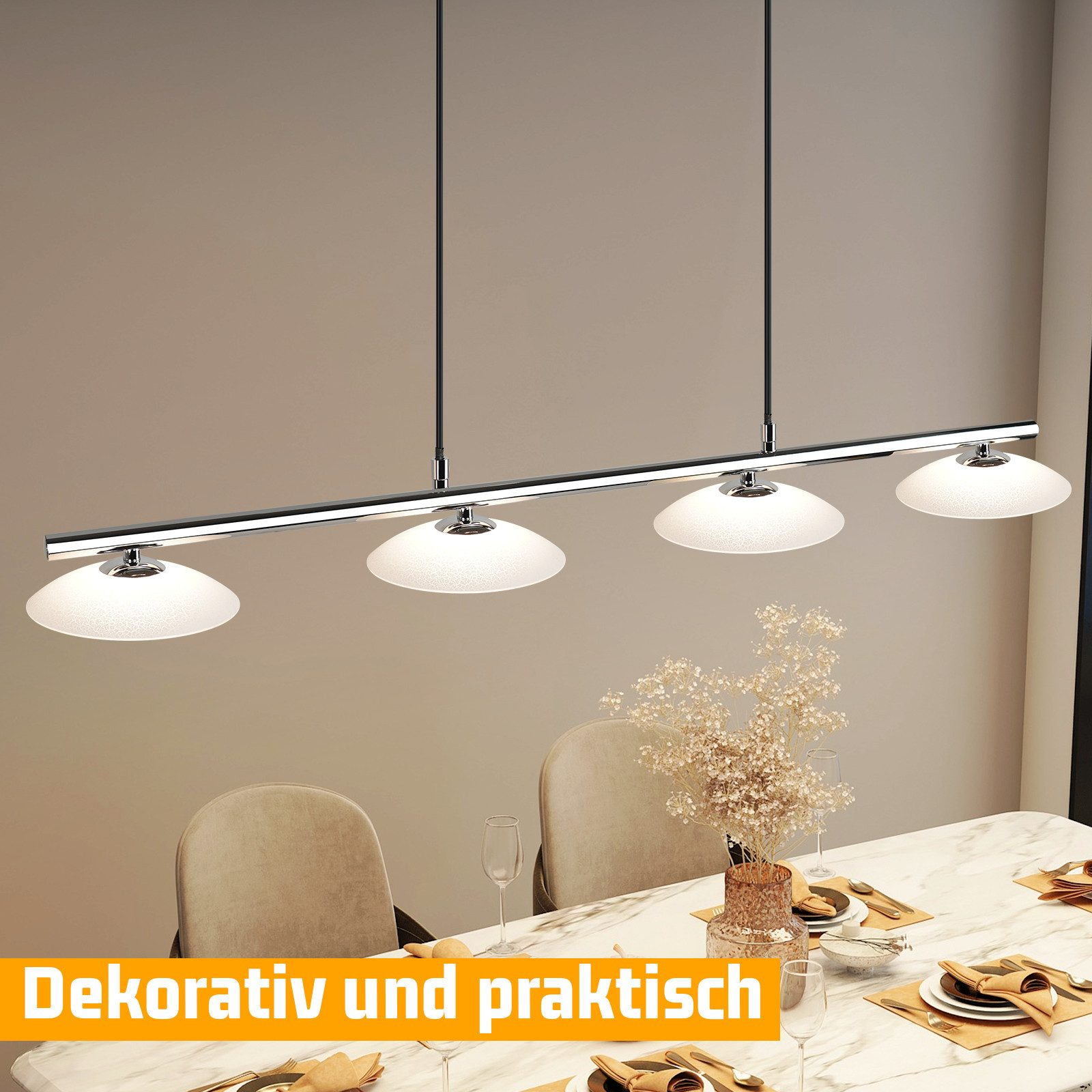 Un candelabro colgante moderno de cuatro luces sobre una mesa de comedor.