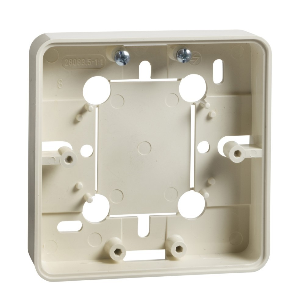 Una scatola elettrica in plastica color crema con fori per viti e punti di montaggio.