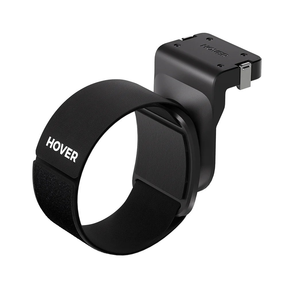 Un cinturino nero marca HOVER con un dispositivo nero attaccato su un lato.