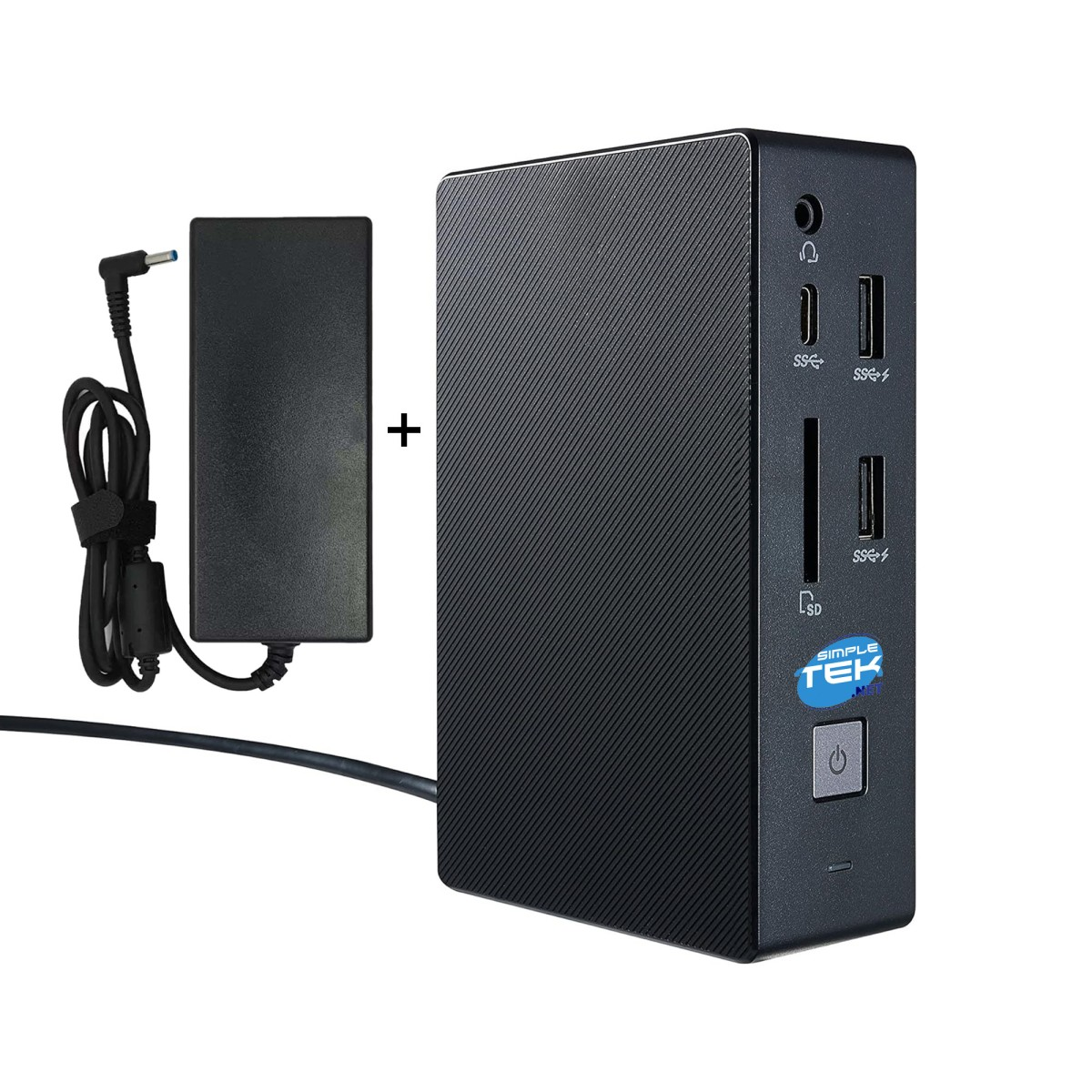 Adattatore di alimentazione nero accanto a un mini PC nero con porte e logo.