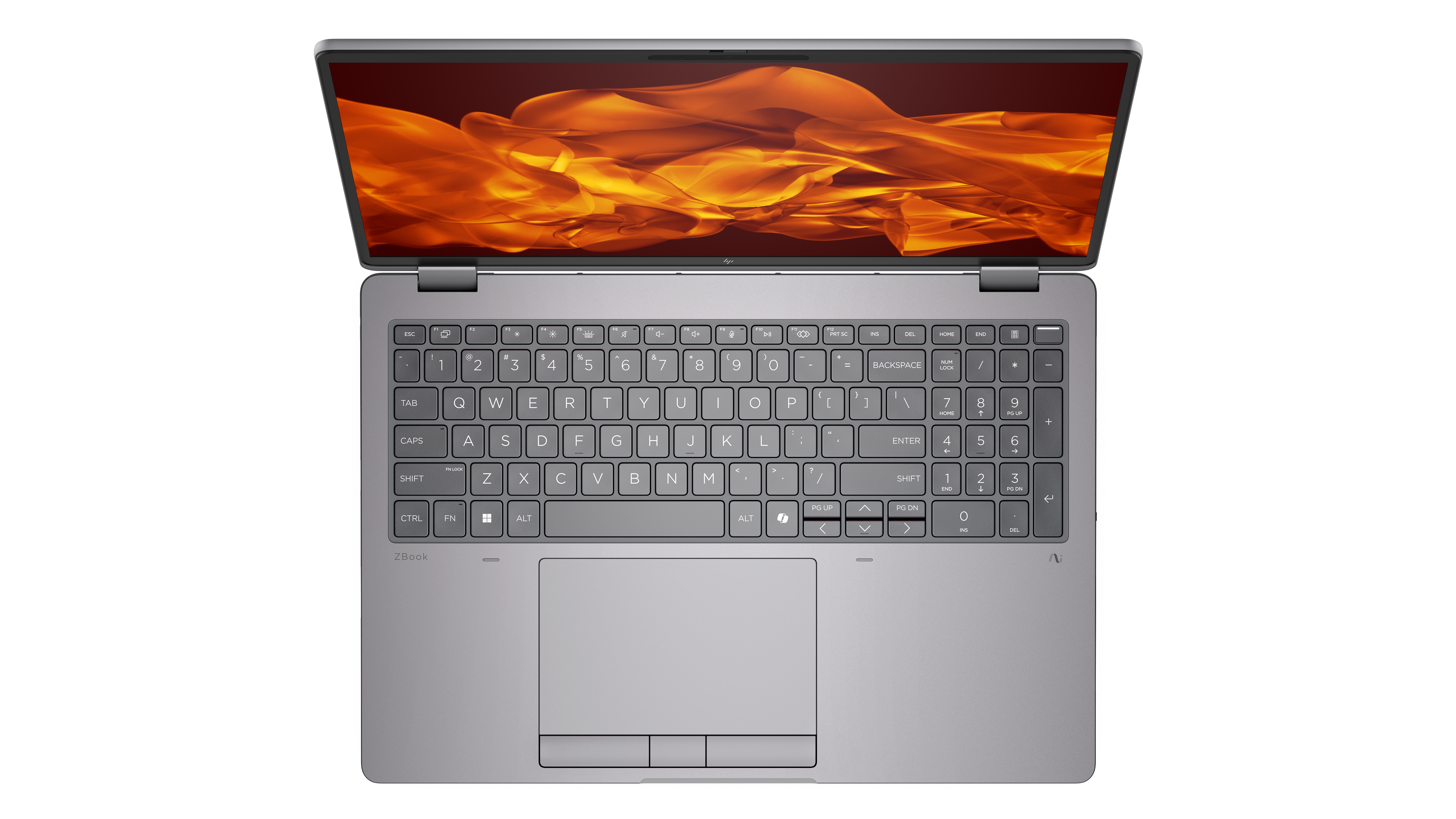 Un laptop argento è aperto, con uno sfondo astratto arancione sullo schermo.