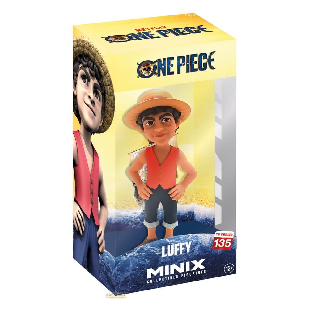 Caja de figurilla coleccionable de One Piece Netflix con Luffy con chaleco naranja, pantalón azul y sombrero.