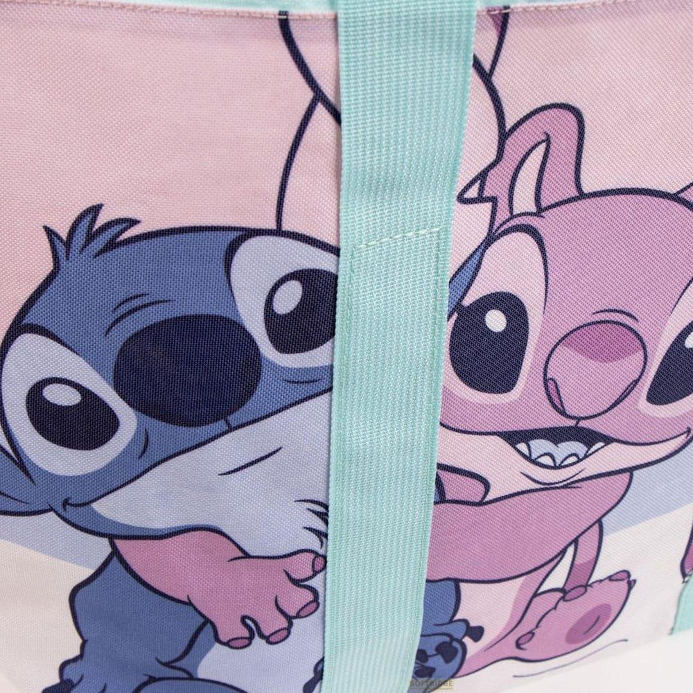 Personajes Stitch azules y rosas sonriendo sobre fondo rosa claro con correa verde menta.