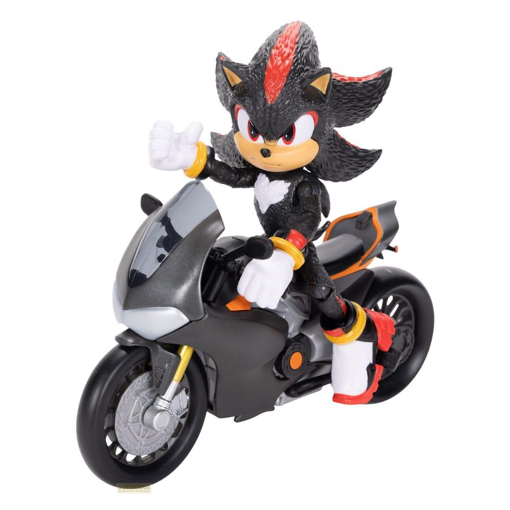 Figura de Shadow the Hedgehog en una motocicleta, saludando con el puño.