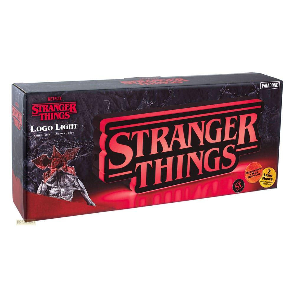 Pudełko z logo Stranger Things i wizerunkiem Demogorgona, czerwony napis na czarnym tle.
