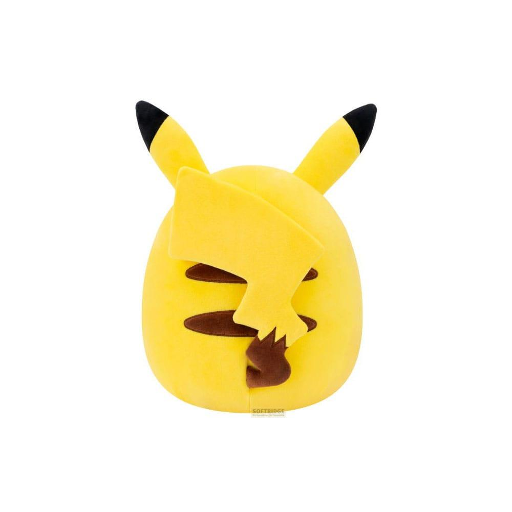 Une peluche jaune aux oreilles noires et joues marron sur fond blanc.