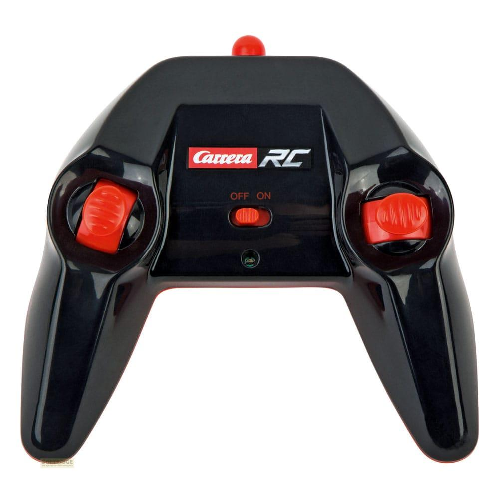Control remoto negro con controles rojos y logo Carrera RC.
