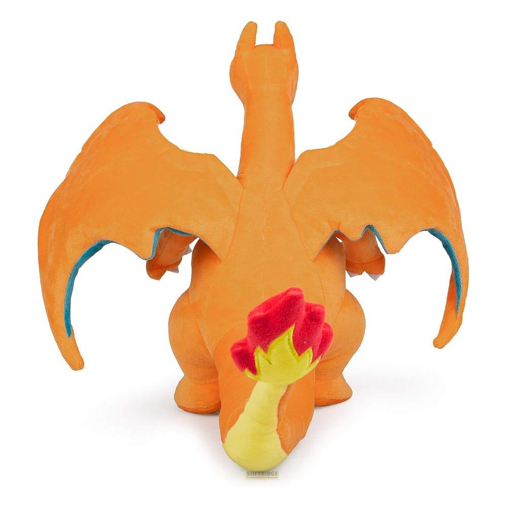 Drago di peluche arancione con grandi ali e una fiamma sulla coda.