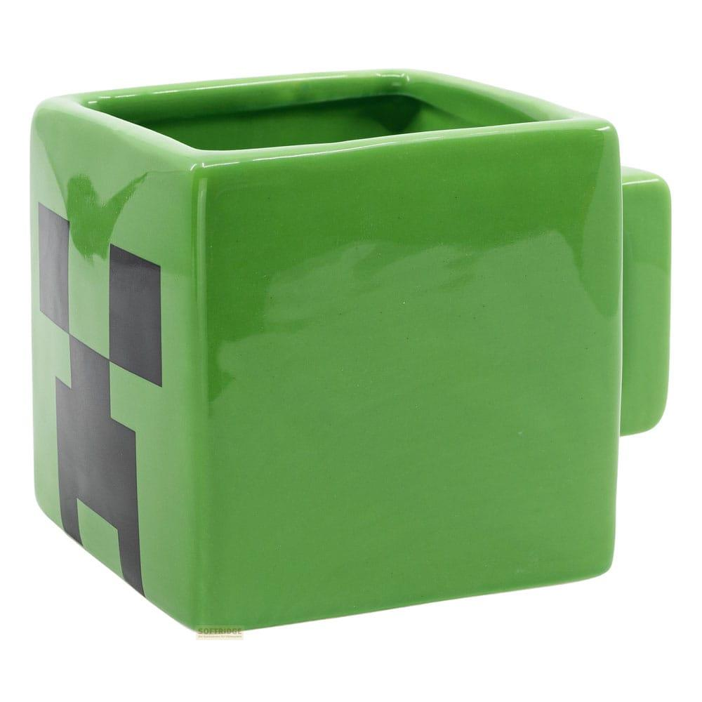 Una taza cuadrada verde de Minecraft Creeper con asa a la derecha.