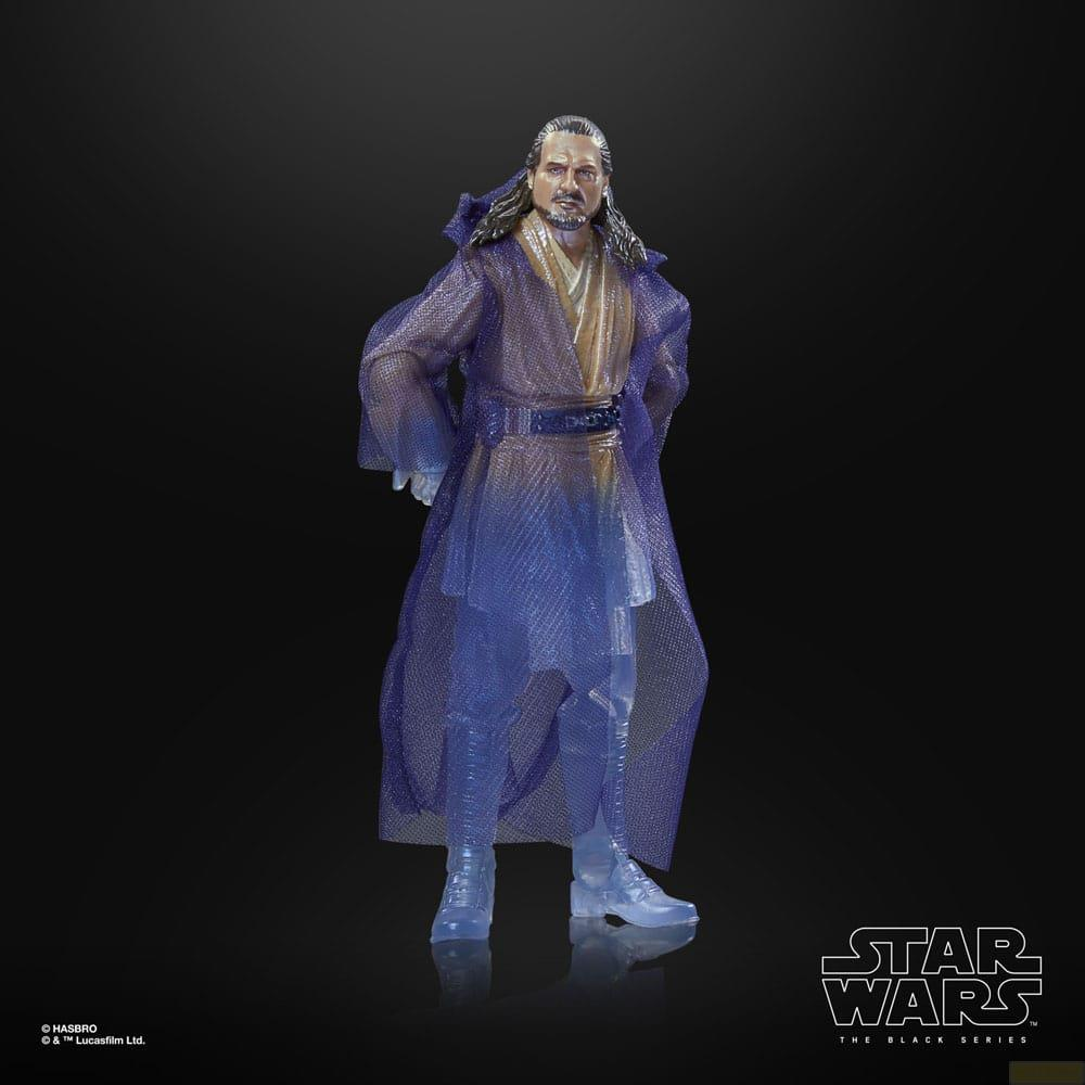 Figura de Star Wars de Qui-Gon Jinn con túnica azul translúcida sobre fondo negro.